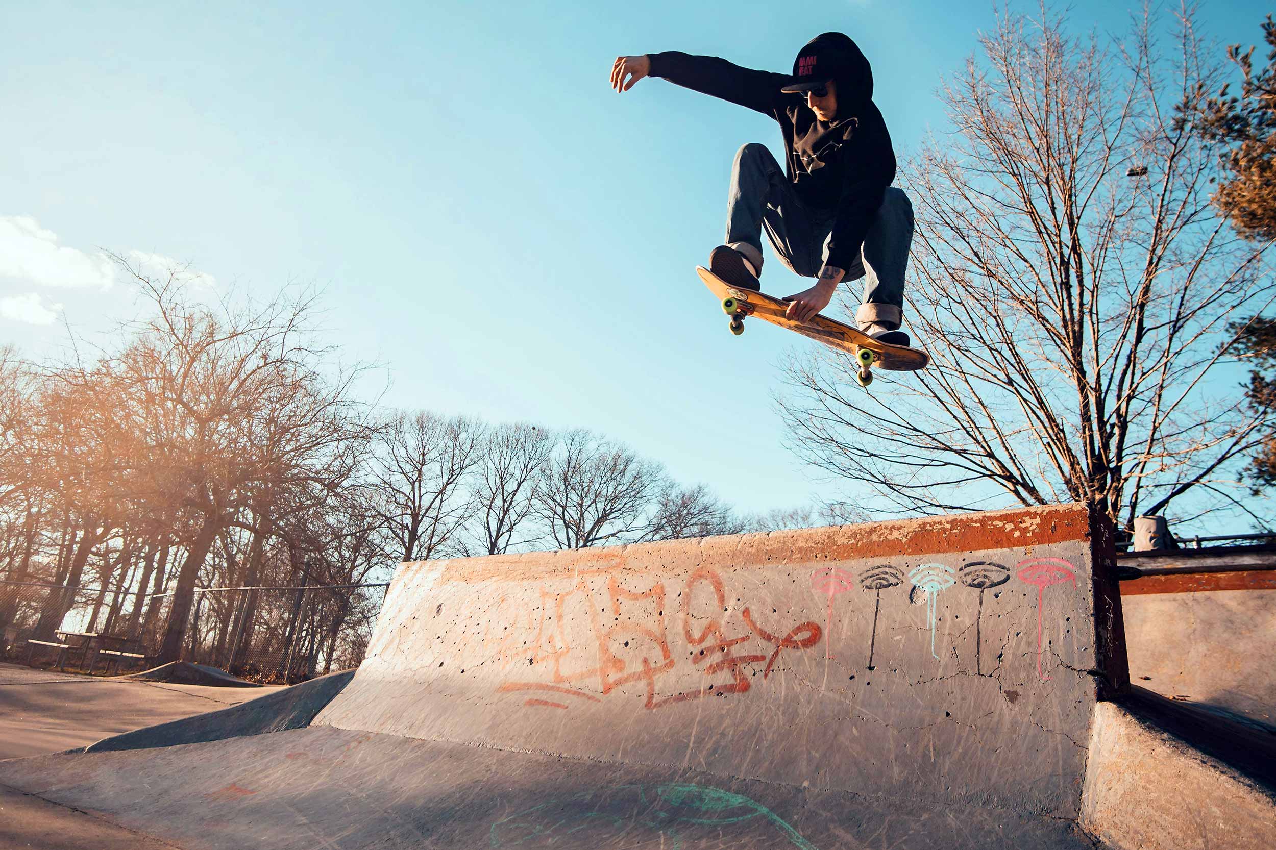Skateboarder enjoying skate park